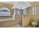 Bathroom featuring garden tub, walk in shower, and toilet at 6121 Piedmont Dr, Spring Hill, FL 34606