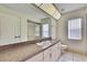 Bright bathroom with a sink, shower, and toilet at 6121 Piedmont Dr, Spring Hill, FL 34606