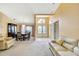 Spacious dining room featuring a large table, elegant chandelier and neutral decor at 6121 Piedmont Dr, Spring Hill, FL 34606