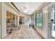 Bright Florida Room featuring tile floors, windows and sliding door access to outside at 6121 Piedmont Dr, Spring Hill, FL 34606