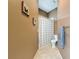 Hallway bathroom with tile floors, shower curtain and fixtures at 6204 Rockross Ave, New Port Richey, FL 34655