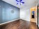 Spacious bedroom featuring hardwood floors and a neutral color scheme at 6204 Rockross Ave, New Port Richey, FL 34655
