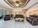 This open-concept living room features a seamless flow into the kitchen and dining areas, ideal for entertaining at 6204 Rockross Ave, New Port Richey, FL 34655