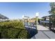 Boat Lift on the water surrounded by hedges at 6503 Santiago Ct, Apollo Beach, FL 33572
