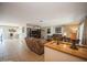 Comfortable living room featuring tile floors, neutral paint, and an open layout with lots of natural light at 6503 Santiago Ct, Apollo Beach, FL 33572