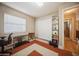Home office with natural light, shelving, storage, and comfortable work space at 6503 Santiago Ct, Apollo Beach, FL 33572