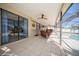 Enjoy the outdoors in this screened patio, complete with seating and pool view at 6503 Santiago Ct, Apollo Beach, FL 33572