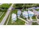 Aerial view of colorful coastal homes by a canal, with boats docked in the back at 6512 Simone Shores Cir, Apollo Beach, FL 33572