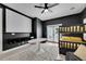 Bedroom featuring a bunk bed, fluffy white rug, and access to an outdoor balcony with glass french doors at 6512 Simone Shores Cir, Apollo Beach, FL 33572