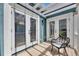 Inviting outdoor porch with neutral furniture and a view at 6512 Simone Shores Cir, Apollo Beach, FL 33572