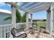 Charming porch with seating and a scenic view at 6512 Simone Shores Cir, Apollo Beach, FL 33572