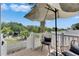 Outdoor seating area with shade and views of the canal at 6512 Simone Shores Cir, Apollo Beach, FL 33572