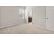 Comfortable bedroom with plush carpet, a window, and ensuite bathroom access at 6711 Rocky Park St, Tampa, FL 33625