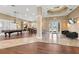 Clubhouse featuring a billiards table, dining area, and comfortable seating for entertaining guests at 7001 Interbay Blvd # 242, Tampa, FL 33616