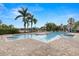 A clear and well-maintained community pool surrounded by lounge chairs, perfect for relaxation at 7001 Interbay Blvd # 242, Tampa, FL 33616