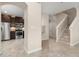 Bright, neutral kitchen with stainless steel appliances and dark wood cabinetry at 7001 Interbay Blvd # 242, Tampa, FL 33616