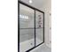 Modern bathroom with a shower, clear glass door, and tiled walls at 7001 Interbay Blvd # 242, Tampa, FL 33616