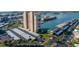 Scenic aerial view of a condo building, showcasing beautiful waterfront views and convenient covered parking at 7300 Sun Island S Dr # 1505, South Pasadena, FL 33707