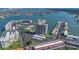 Expansive aerial view showcasing waterfront condo buildings and amenities nestled along the water at 7300 Sun Island S Dr # 1505, South Pasadena, FL 33707
