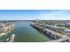 Beautiful aerial view of the water, surrounding buildings, and landscape at 7300 Sun Island S Dr # 1505, South Pasadena, FL 33707