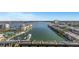 Scenic aerial view of waterfront property with docks, boats, and a clear blue sky at 7300 Sun Island S Dr # 1505, South Pasadena, FL 33707