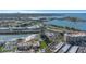 Expansive aerial view showcasing waterfront condo buildings and amenities nestled along the water at 7300 Sun Island S Dr # 1505, South Pasadena, FL 33707