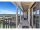 Balcony with railings overlooks city and waterway at 7300 Sun Island S Dr # 1505, South Pasadena, FL 33707