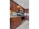 Kitchen features stainless steel appliances, ample cabinet space, and plenty of room for cooking at 7300 Sun Island S Dr # 1505, South Pasadena, FL 33707