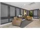 Elegant condo building lobby featuring stylish seating, tasteful decor, and a welcoming ambiance at 7300 Sun Island S Dr # 1505, South Pasadena, FL 33707