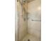 Updated tile shower with a built-in bench and grab bar at 7300 Sun Island S Dr # 1505, South Pasadena, FL 33707