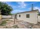 A view of the back of the home with partial fencing at 7524 Tidewater Trl, Tampa, FL 33619