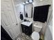 Modern bathroom with black and white patterned floors, stylish vanity, and updated fixtures at 8341 41St N Ave, St Petersburg, FL 33709
