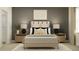 Warm, inviting bedroom featuring a minimalist design with neutral tones and modern decor at 9583 Runaway Breeze Dr, Land O Lakes, FL 34637