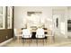 Elegant dining room with natural light, modern table, and stylish decor; perfect for entertaining at 9583 Runaway Breeze Dr, Land O Lakes, FL 34637