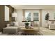 Inviting living room with comfortable seating, soft lighting, and stylish accents; ideal for relaxation at 9583 Runaway Breeze Dr, Land O Lakes, FL 34637