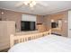 Spacious bedroom with a large window and TV at 1001 57Th N Ave, St Petersburg, FL 33703