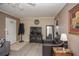 Cozy living room showcasing wood-look flooring, a sleek TV setup, and ample natural light at 1001 57Th N Ave, St Petersburg, FL 33703