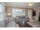 Comfortable living room with neutral tones, two sofas, and lots of natural light at 1001 57Th N Ave, St Petersburg, FL 33703