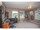 Home office featuring natural light, comfortable seating, computer desk and decor at 1001 57Th N Ave, St Petersburg, FL 33703