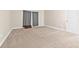 Bright bedroom features neutral paint, soft carpet, and a window at 10707 Pegasus Valley Ct, Tampa, FL 33647