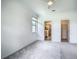A spacious bedroom with an ensuite bathroom and walk-in closet, offering convenience and ample storage at 11100 Balfour St, Venice, FL 34293