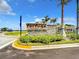 Entrance to Tortuga, a Lennar community, showcasing lush landscaping and a welcoming sign at 11100 Balfour St, Venice, FL 34293
