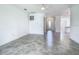 Spacious living room boasts modern tile floors and neutral walls at 11100 Balfour St, Venice, FL 34293