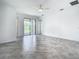 Bright living area with sliding glass doors to the backyard at 11100 Balfour St, Venice, FL 34293