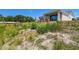 Expansive backyard featuring a covered patio, perfect for outdoor enjoyment at 11313 Hardwood Hammock Ln, Riverview, FL 33569
