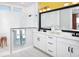 Modern bathroom with double vanity, walk-in shower, and stylish decor at 11313 Hardwood Hammock Ln, Riverview, FL 33569