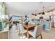 Open concept dining area connects to the kitchen and living room, providing a seamless entertaining and living space at 11313 Hardwood Hammock Ln, Riverview, FL 33569
