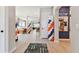 Bright and inviting foyer with hardwood floors, decorated with festive balloons for a welcoming atmosphere at 11313 Hardwood Hammock Ln, Riverview, FL 33569