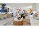 Comfortable living room featuring contemporary decor, wood floors, and an open concept design at 11313 Hardwood Hammock Ln, Riverview, FL 33569