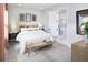 Serene main bedroom with soft colors, ensuite bathroom and stylish decor at 11313 Hardwood Hammock Ln, Riverview, FL 33569